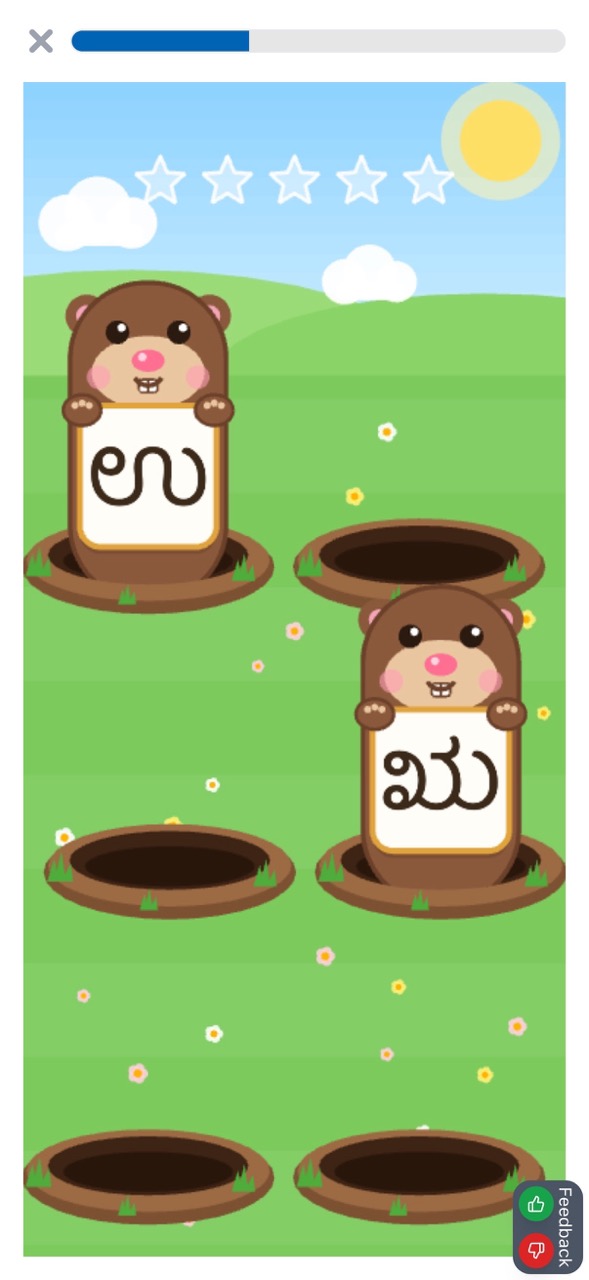 Mole boop: two moles pop up holding Kannada letters